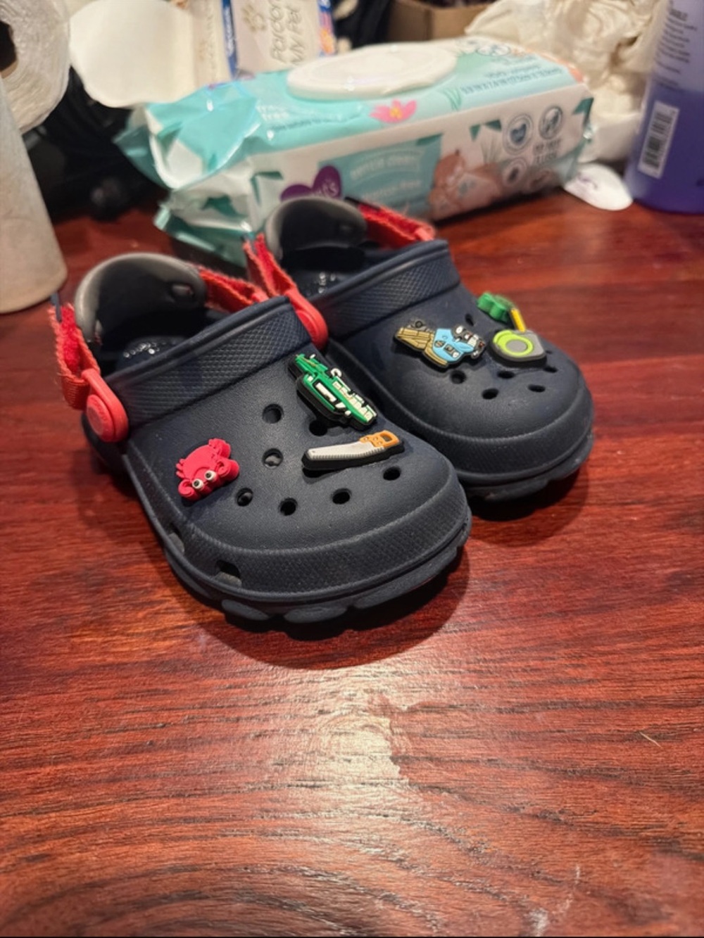 CROCS Kids Navy Clogs with Red Heel Strap and Fun Charms